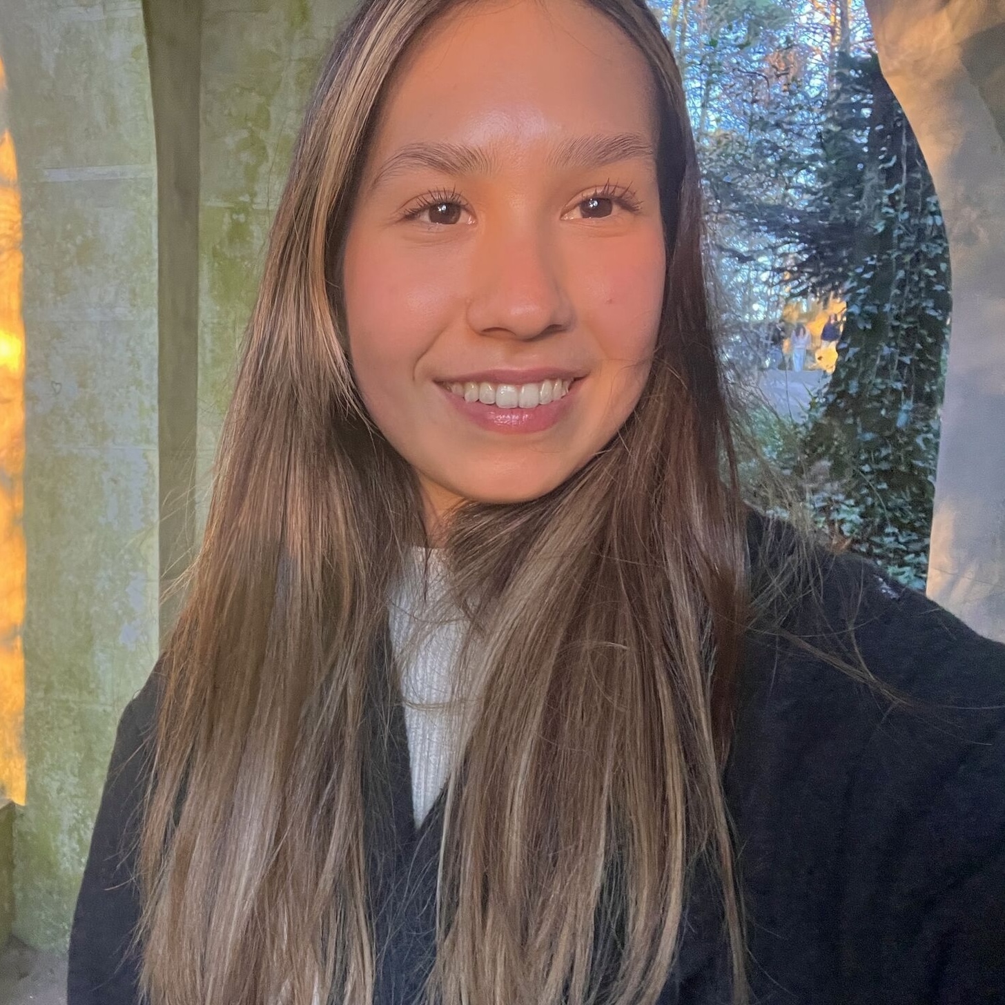 An image of a woman smiling.